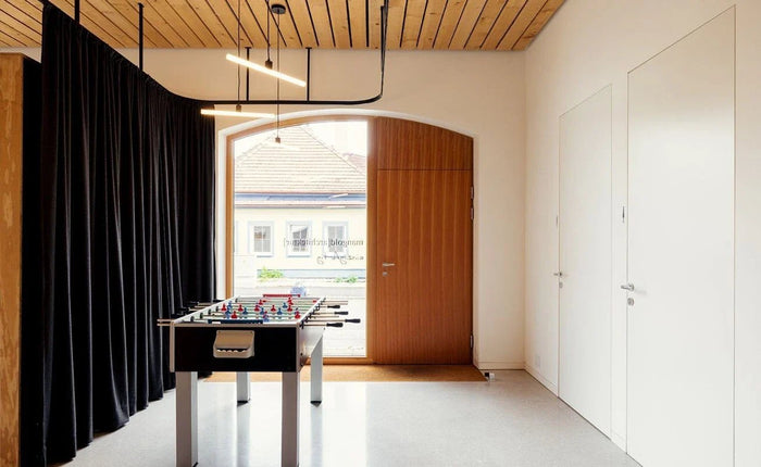 Luce e design moderno nello studio di architettura austriaco con le lampade lineari S14D - Creative Cables