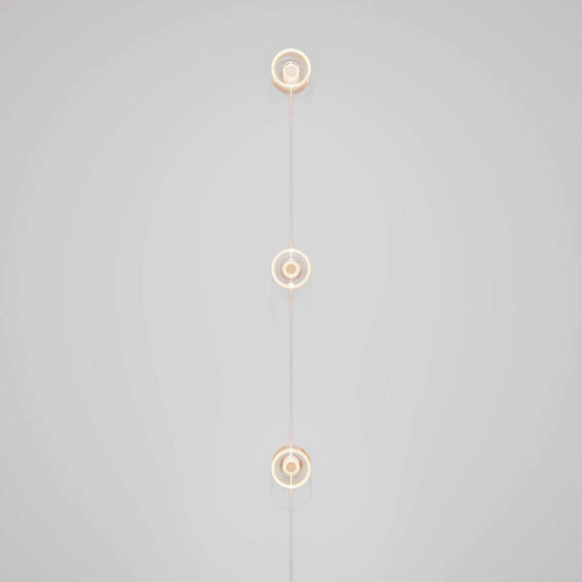 Lampada da parete Spostaluce con spina, 3 lampadine Ghost e cavo grigio melange