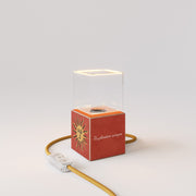 Lampada da tavolo Cubetto "Il sole" con lampadina Ghost - Santomanifesto